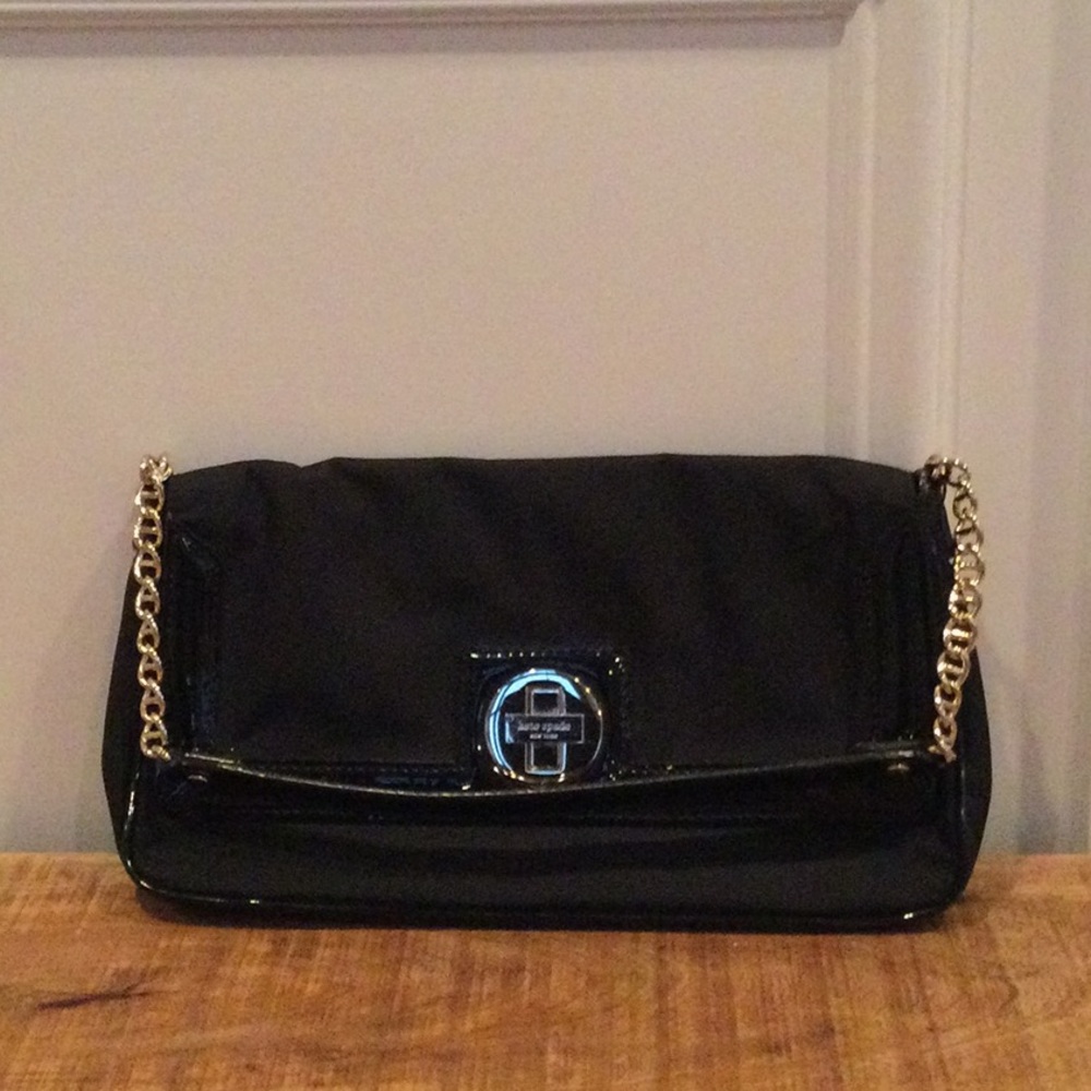 Black Kate Spade handbag with gold chain-strap